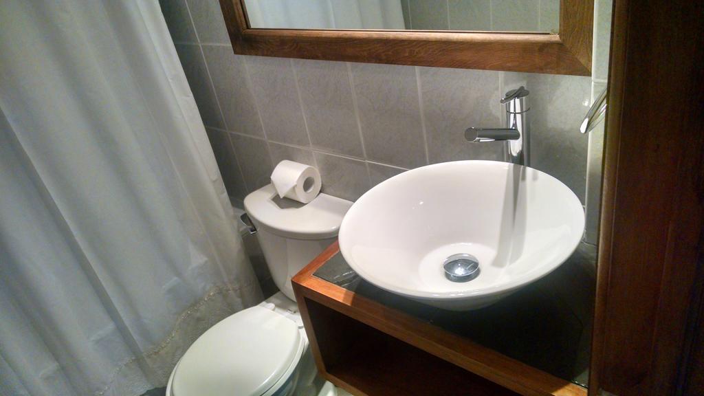 Hostal Buena Estancia Punta Arenas Rum bild